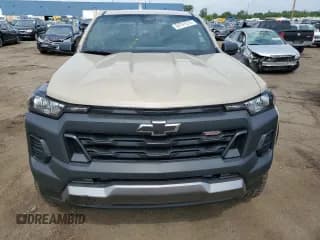 ✅ 2023 Chevrolet Colorado 4WD Trail Boss • VIN: 1GCPTEEK3P1263830 • Лот: 64741514. Опубликован ранее на Copart с пробегом 6 897 миль. Бесплатный доступ к архиву аукционных продаж из США и подробный отчёт об истории автомобиля на DreamBid. Изображение 5.