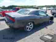 2014 Dodge Challenger SXT z VIN 2C3CDYAG3EH143382, wystawiony jako IAAI lot #43081160 z przebiegiem 35 011 mil mil oraz . Historia ofert i sprzedaży dostępna na DreamBid. Obrazek 4.