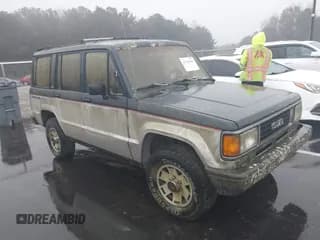 ✅ 1988 Isuzu Trooper • VIN: JAACH18E5J7822790 • Lot: 43741895. Listed on IAAI with 156,514 mi. Free auction sales archive from the USA and detailed vehicle history report at DreamBid. Image 1.