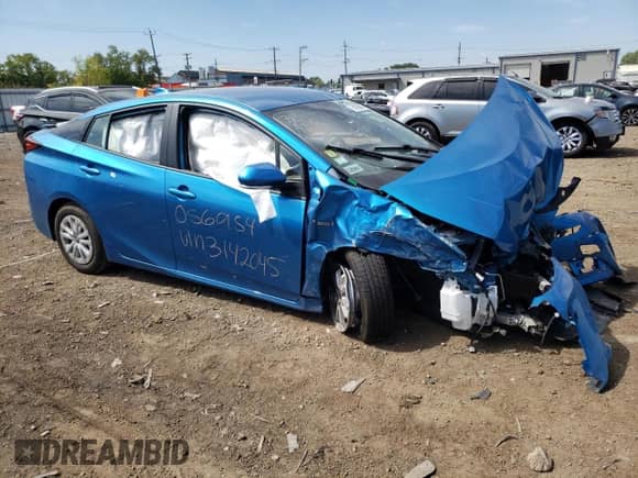 2021 Toyota Prius L Eco with VIN JTDKAMFU1M3142045, listed as a Copart auction lot 71478995 with Not provided miles and Salvage title. Bid and sale history available at DreamBid. Image 4.
