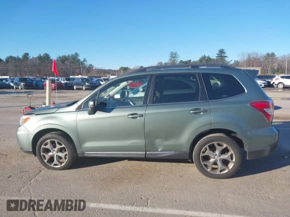 ✅ 2015 Subaru Forester Touring • VIN: JF2SJAUC7FH588703 • Lot: 43680535. Listed on IAAI with 234,995 mi. Free auction sales archive from the USA and detailed vehicle history report at DreamBid. Image 14.