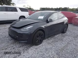 ✅ 2025 Tesla Model Y Long Range • VIN: 7SAYGDEE7SF307215 • Lot: 43506572. Listed on IAAI with 14,288 mi. Free auction sales archive from the USA and detailed vehicle history report at DreamBid. Image 2.