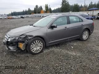 ✅ 2011 Ford Fusion Hybrid • VIN: 3FADP0L38BR335499 • Lot: 90818935. Listed on Copart with 129,544 mi. Free auction sales archive from the USA and detailed vehicle history report at DreamBid. Image 1.