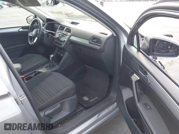 ✅ 2023 Volkswagen Tiguan S • VIN: 3VVRB7AX2PM054656 • Lot: 43660280. Listed on IAAI with 38,934 mi. Free auction sales archive from the USA and detailed vehicle history report at DreamBid. Image 5.