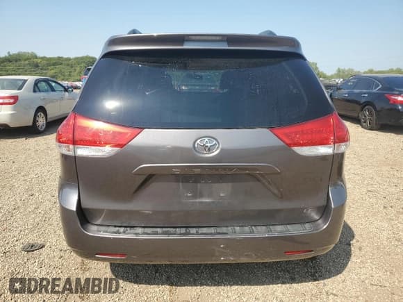 ✅ 2014 Toyota Sienna LE AAS • VIN: 5TDKK3DC7ES496377 • Lot: 80090825. Listed on Copart with 129,053 mi. Free auction sales archive from the USA and detailed vehicle history report at DreamBid. Image 6.