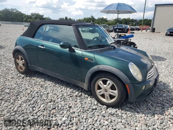 ✅ 2007 MINI Convertible • VIN: WMWRF335X7TG16568 • Лот: 66146885. Опубликован ранее на Copart с пробегом 97 502 миль. Бесплатный доступ к архиву аукционных продаж из США и подробный отчёт об истории автомобиля на DreamBid. Изображение 4.