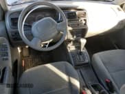 ✅ 2003 Suzuki Vitara • VIN: 2S3TE52V936103483 • Lot: 82235884. Listed on Copart with 173,354 mi. Free auction sales archive from the USA and detailed vehicle history report at DreamBid. Image 8.