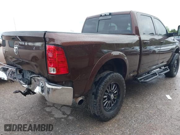 ✅ 2015 Ram 2500 Longhorn • VIN: 3C6UR5GL5FG501384 • Lot: 42133077. Listed on IAAI with 306,714 mi. Free auction sales archive from the USA and detailed vehicle history report at DreamBid. Image 4.
