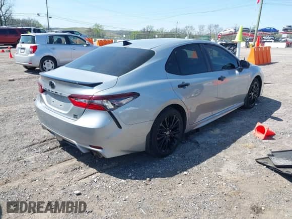 2021 Toyota Camry SE with VIN 4T1G11BK3MU026604, listed as a IAAI auction lot 42000560 with 104,453 mi miles and . Bid and sale history available at DreamBid. Image 4.