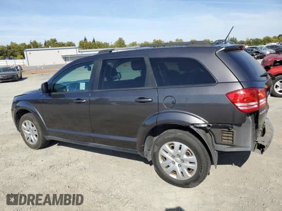 2017 Dodge Journey SE with VIN 3C4PDCAB3HT551168, listed as a Copart auction lot 71287445 with 148,553 mi miles and Salvage title. Bid and sale history available at DreamBid. Image 2.