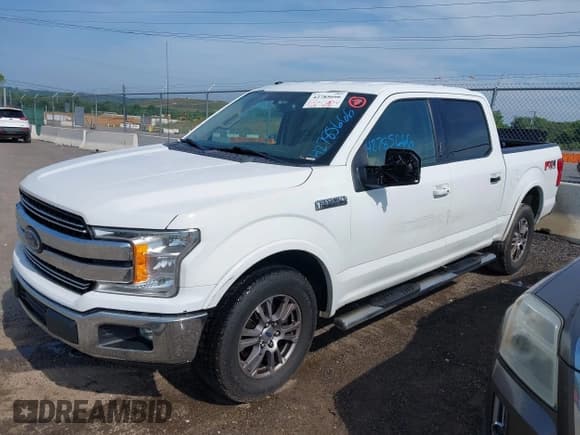 ✅ 2018 Ford F-150 XL • VIN: 1FTEW1E5XJFB59976 • Lot: 42785666. Listed on IAAI with 185,286 mi. Free auction sales archive from the USA and detailed vehicle history report at DreamBid. Image 2.