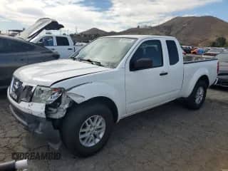 2012 Nissan Frontier S with VIN 1N6BD0CT4CC402946, listed as a Copart auction lot 90322835 with 87,356 mi miles and Salvage title. Bid and sale history available at DreamBid. Image 1.
