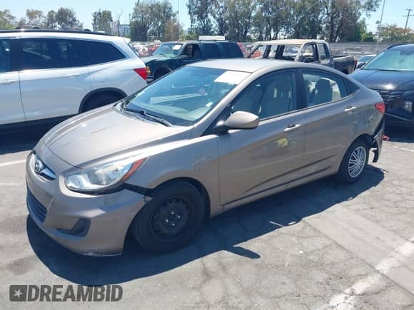 2014 Hyundai Accent GLS with VIN KMHCT4AE8EU655136, listed as a IAAI auction lot 42797016 with 102,554 mi miles and . Bid and sale history available at DreamBid. Image 2.
