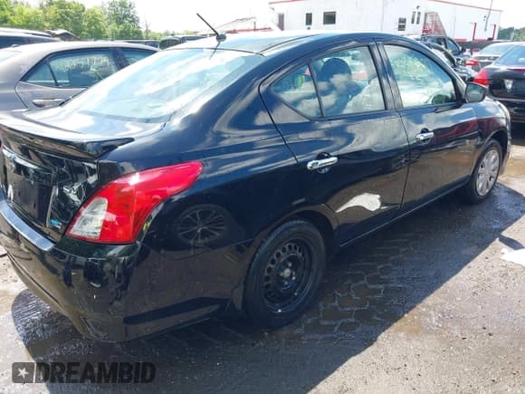 ✅ 2016 Nissan Versa SV • VIN: 3N1CN7AP5GL883838 • Lot: 42266737. Listed on IAAI with 98,732 mi. Free auction sales archive from the USA and detailed vehicle history report at DreamBid. Image 4.