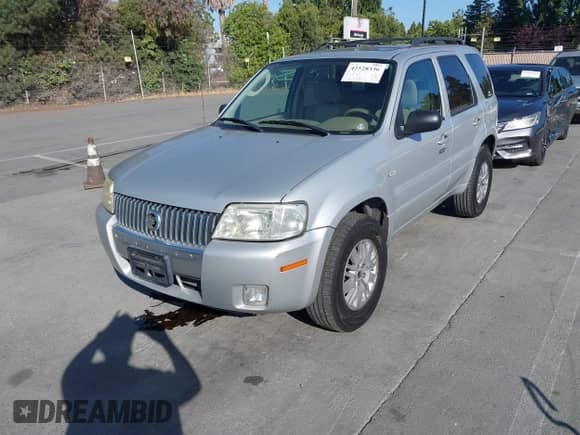 2006 Mercury Mariner Luxury z VIN 4M2YU56196DJ05801, wystawiony jako IAAI lot #42528336 z przebiegiem 162 851 mil mil oraz . Historia ofert i sprzedaży dostępna na DreamBid. Obrazek 6.