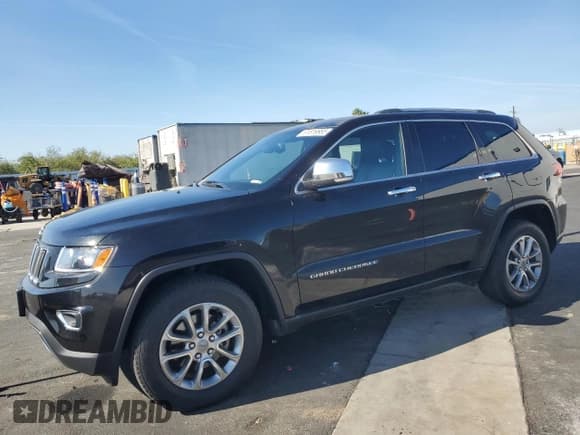 ✅ 2015 Jeep Grand Cherokee Limited • VIN: 1C4RJEBG3FC749751 • Лот: 91819955. Опубликован ранее на Copart с пробегом 104 535 миль. Бесплатный доступ к архиву аукционных продаж из США и подробный отчёт об истории автомобиля на DreamBid. Изображение 1.