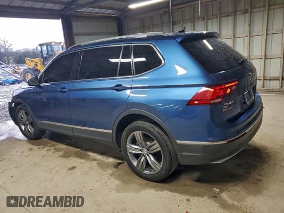 ✅ 2018 Volkswagen Tiguan SEL Premium • VIN: 3VV5B7AX5JM092453 • Лот: 93933515. Опубликован ранее на Copart с пробегом 86 177 миль. Бесплатный доступ к архиву аукционных продаж из США и подробный отчёт об истории автомобиля на DreamBid. Изображение 2.