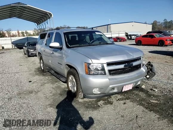 ✅ 2014 Chevrolet Suburban LT • VIN: 1GNSCJE05ER196090 • Lot: 90521905. Listed on Copart with 221,298 mi. Free auction sales archive from the USA and detailed vehicle history report at DreamBid. Image 14.