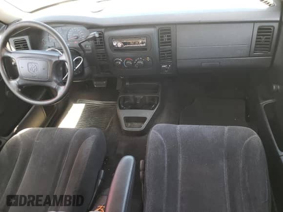 2004 Dodge Dakota z VIN 1D7GL12K44S653683, wystawiony jako Copart lot #69008954 z przebiegiem 135 546 mil mil oraz Szkoda całkowita • Salvage title. Historia ofert i sprzedaży dostępna na DreamBid. Obrazek 8.