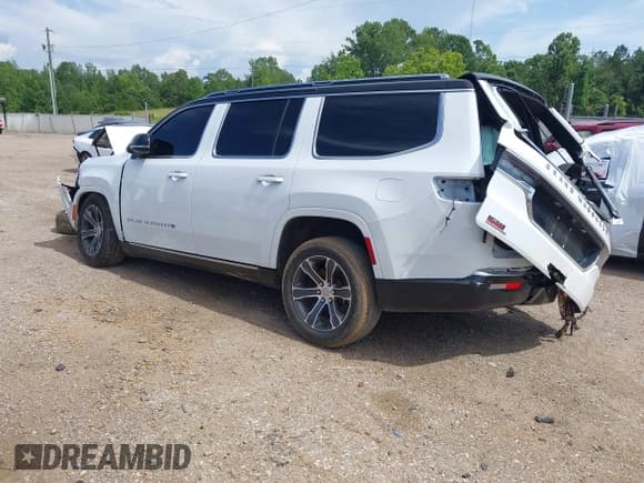✅ 2023 Jeep Grand Wagoneer • VIN: 1C4SJVEJ5PS510508 • Lot: 42517656. Listed on IAAI with 35,939 mi. Free auction sales archive from the USA and detailed vehicle history report at DreamBid. Image 3.