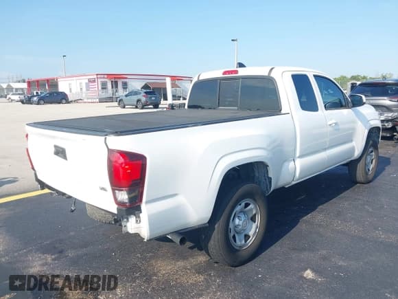 ✅ 2023 Toyota Tacoma SR • VIN: 3TYRZ5CN3PT027187 • Lot: 42334368. Listed on IAAI with 37,819 mi. Free auction sales archive from the USA and detailed vehicle history report at DreamBid. Image 4.