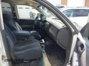 ✅ 2003 Dodge Dakota SLT • VIN: 1D7HL48X63S144573 • Lot: 42798150. Wystawiony na IAAI z przebiegiem 224 361 mil. Bezpłatny archiwum sprzedaży aukcyjnych z USA i szczegółowy raport historii pojazdu na DreamBid. Zdjęcie 5.