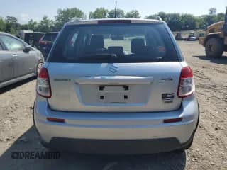 ✅ 2010 Suzuki SX4 • VIN: JS2YB5A32A6302073 • Лот: 75639124. Опубликован ранее на Copart с пробегом 104 816 миль. Бесплатный доступ к архиву аукционных продаж из США и подробный отчёт об истории автомобиля на DreamBid. Изображение 6.