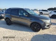 ✅ 2017 Ford Escape Titanium • VIN: 1FMCU0JDXHUC50770 • Lot: 90301085. Wystawiony na Copart z przebiegiem 87 598 mil. Bezpłatny archiwum sprzedaży aukcyjnych z USA i szczegółowy raport historii pojazdu na DreamBid. Zdjęcie 4.
