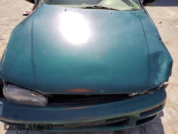 ✅ 1997 Subaru Impreza • VIN: JF1GM4255VH401478 • Lot: 56221515. Listed on Copart with 75,202 mi. Free auction sales archive from the USA and detailed vehicle history report at DreamBid. Image 11.