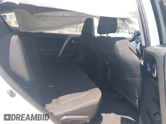 ✅ 2018 Toyota RAV4 XLE • VIN: 2T3WFREV1JW459553 • Lot: 42423474. Listed on IAAI with 129,523 mi. Free auction sales archive from the USA and detailed vehicle history report at DreamBid. Image 8.