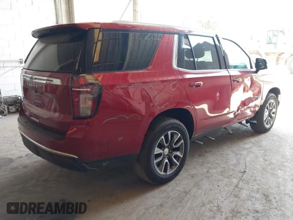✅ 2021 Chevrolet Tahoe LT • VIN: 1GNSKNKD4MR334864 • Lot: 42570802. Listed on IAAI with 74,038 mi. Free auction sales archive from the USA and detailed vehicle history report at DreamBid. Image 4.