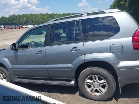 ✅ 2004 Lexus GX 470 • VIN: JTJBT20X340044229 • Lot: 43007958. Wystawiony na IAAI z przebiegiem 213 716 mil. Bezpłatny archiwum sprzedaży aukcyjnych z USA i szczegółowy raport historii pojazdu na DreamBid. Zdjęcie 14.