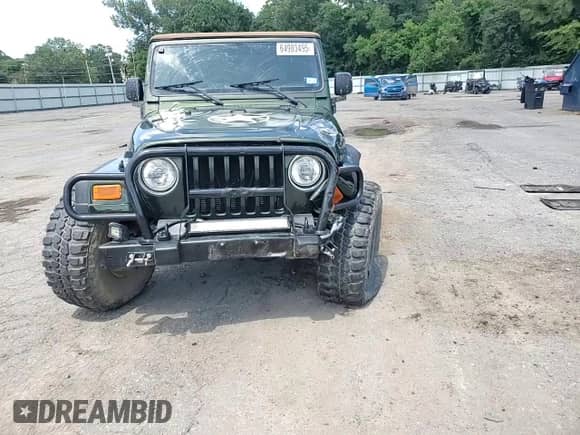 2005 Jeep Wrangler X с VIN 1J4FA39S45P319326, выставлен на аукционе Copart как лот 64983495 с пробегом 156 551 миль миль и Списание • Salvage title. История ставок и продаж доступна на DreamBid. Изображение 14.