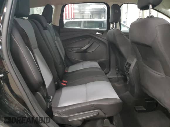 2018 Ford Escape SE z VIN 1FMCU9GD5JUA85387, wystawiony jako Copart lot #91200335 z przebiegiem 142 271 mil mil oraz Szkoda całkowita • Salvage title. Historia ofert i sprzedaży dostępna na DreamBid. Obrazek 11.