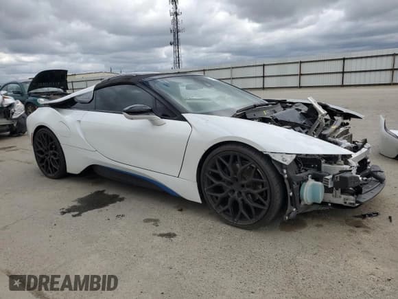 ✅ 2019 BMW i8 • VIN: WBY2Z6C51KVB82985 • Лот: 47491815. Опубликован ранее на Copart с пробегом 74 489 миль. Бесплатный доступ к архиву аукционных продаж из США и подробный отчёт об истории автомобиля на DreamBid. Изображение 4.
