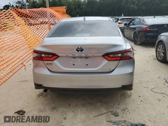 2021 Toyota Camry Hybrid LE with VIN 4T1C31AK7MU562031, listed as a Copart auction lot 71506375 with 82,877 mi miles and Salvage title. Bid and sale history available at DreamBid. Image 6.