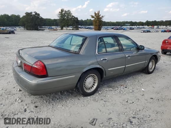✅ 2002 Mercury Grand Marquis LS Premium • VIN: 2MEFM75W12X636126 • Lot: 80376215. Wystawiony na Copart z przebiegiem 159 134 mil. Bezpłatny archiwum sprzedaży aukcyjnych z USA i szczegółowy raport historii pojazdu na DreamBid. Zdjęcie 3.
