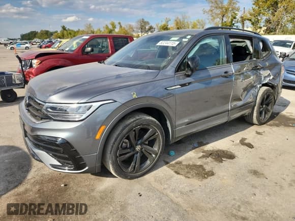 ✅ 2023 Volkswagen Tiguan SE R-Line Black • VIN: 3VVCB7AX1PM057392 • Lot: 82244115. Listed on Copart with 48,658 mi. Free auction sales archive from the USA and detailed vehicle history report at DreamBid. Image 1.