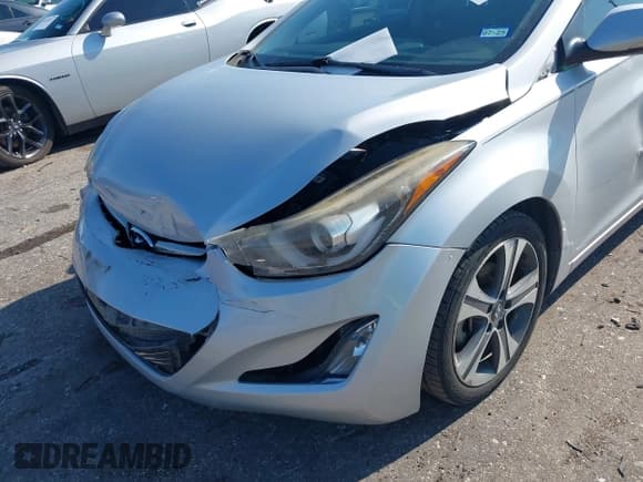 ✅ 2014 Hyundai Elantra Sport • VIN: KMHDH4AH2EU151729 • Lot: 43130523. Listed on IAAI with 100,034 mi. Free auction sales archive from the USA and detailed vehicle history report at DreamBid. Image 6.