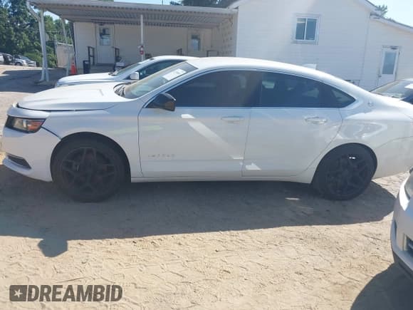 ✅ 2016 Chevrolet Impala LS • VIN: 2G11X5SA7G9159822 • Lot: 42750903. Listed on IAAI with 114,041 mi. Free auction sales archive from the USA and detailed vehicle history report at DreamBid. Image 14.