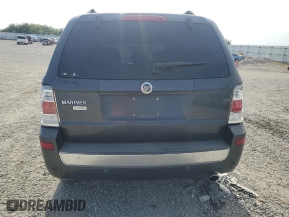 ✅ 2009 Mercury Mariner Premier • VIN: 4M2CU87GX9KJ18412 • Lot: 65004665. Wystawiony na Copart z przebiegiem 198 272 mil. Bezpłatny archiwum sprzedaży aukcyjnych z USA i szczegółowy raport historii pojazdu na DreamBid. Zdjęcie 6.