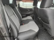 ✅ 2023 Toyota Tacoma TRD Sport • VIN: 3TMCZ5AN1PM557548 • Лот: 82419795. Опубликован ранее на Copart с пробегом 58 725 миль. Бесплатный доступ к архиву аукционных продаж из США и подробный отчёт об истории автомобиля на DreamBid. Изображение 10.