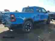 2021 Ram 1500 Rebel with VIN 1C6SRFLT9MN831925, listed as a Copart auction lot 83924035 with 85,885 mi miles and Salvage title. Bid and sale history available at DreamBid. Image 3.