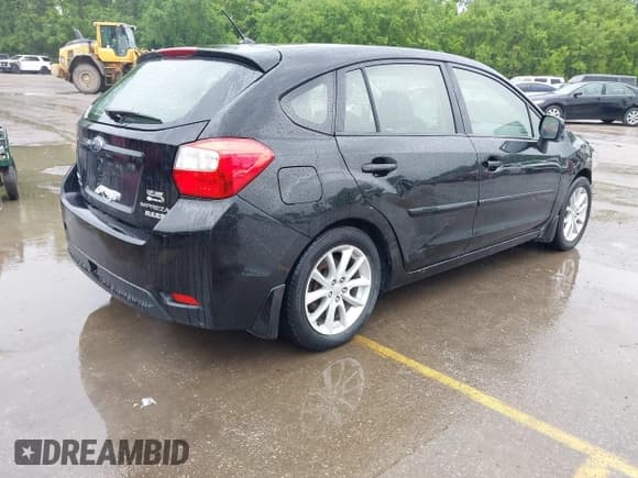 ✅ 2012 Subaru Impreza Premium • VIN: JF1GPAC65CH245193 • Lot: 42204378. Listed on IAAI with 197,832 mi. Free auction sales archive from the USA and detailed vehicle history report at DreamBid. Image 4.