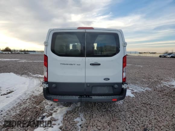 ✅ 2018 Ford Transit • VIN: 1FTYE9ZM3JKA20344 • Lot: 41791985. Listed on Copart with 93,748 mi. Free auction sales archive from the USA and detailed vehicle history report at DreamBid. Image 6.