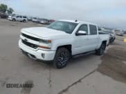 ✅ 2018 Chevrolet Silverado 1500 LT • VIN: 3GCUKREC8JG443934 • Lot: 43266162. Listed on IAAI with 79,404 mi. Free auction sales archive from the USA and detailed vehicle history report at DreamBid. Image 2.