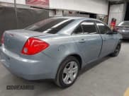 ✅ 2009 Pontiac G6 1SA • VIN: 1G2ZG57B594173353 • Lot: 42863577. Wystawiony na IAAI z przebiegiem 151 522 mil. Bezpłatny archiwum sprzedaży aukcyjnych z USA i szczegółowy raport historii pojazdu na DreamBid. Zdjęcie 4.