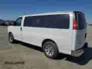 2014 Chevrolet Express Passenger 1LT with VIN 1GNSGCF43E1130315, listed as a Copart auction lot 69969665 with 148,721 mi miles and Salvage title. Bid and sale history available at DreamBid. Image 2.