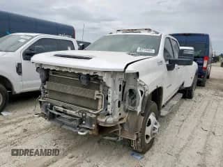 2022 Chevrolet Silverado 3500HD High Country с VIN 1GC4YVEY7NF285676, выставлен на аукционе Copart как лот 62726495 с пробегом 98 944 миль миль и Списание • Salvage title. История ставок и продаж доступна на DreamBid. Изображение 1.