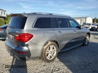 ✅ 2014 Mercedes-Benz GL 450 • VIN: 4JGDF7CE8EA276052 • Lot: 85343655. Listed on Copart with 140,531 mi. Free auction sales archive from the USA and detailed vehicle history report at DreamBid. Image 3.